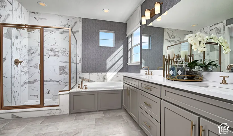 Walk-in shower with bronze-finish frame, built-in soaking tub, dual vanity with undermount sinks, bronze-finish fixtures, and large mirrors