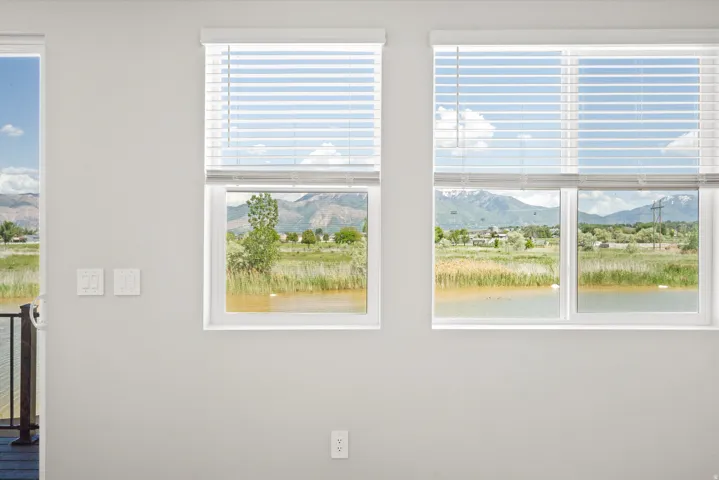 White interior walls complement multiple windows