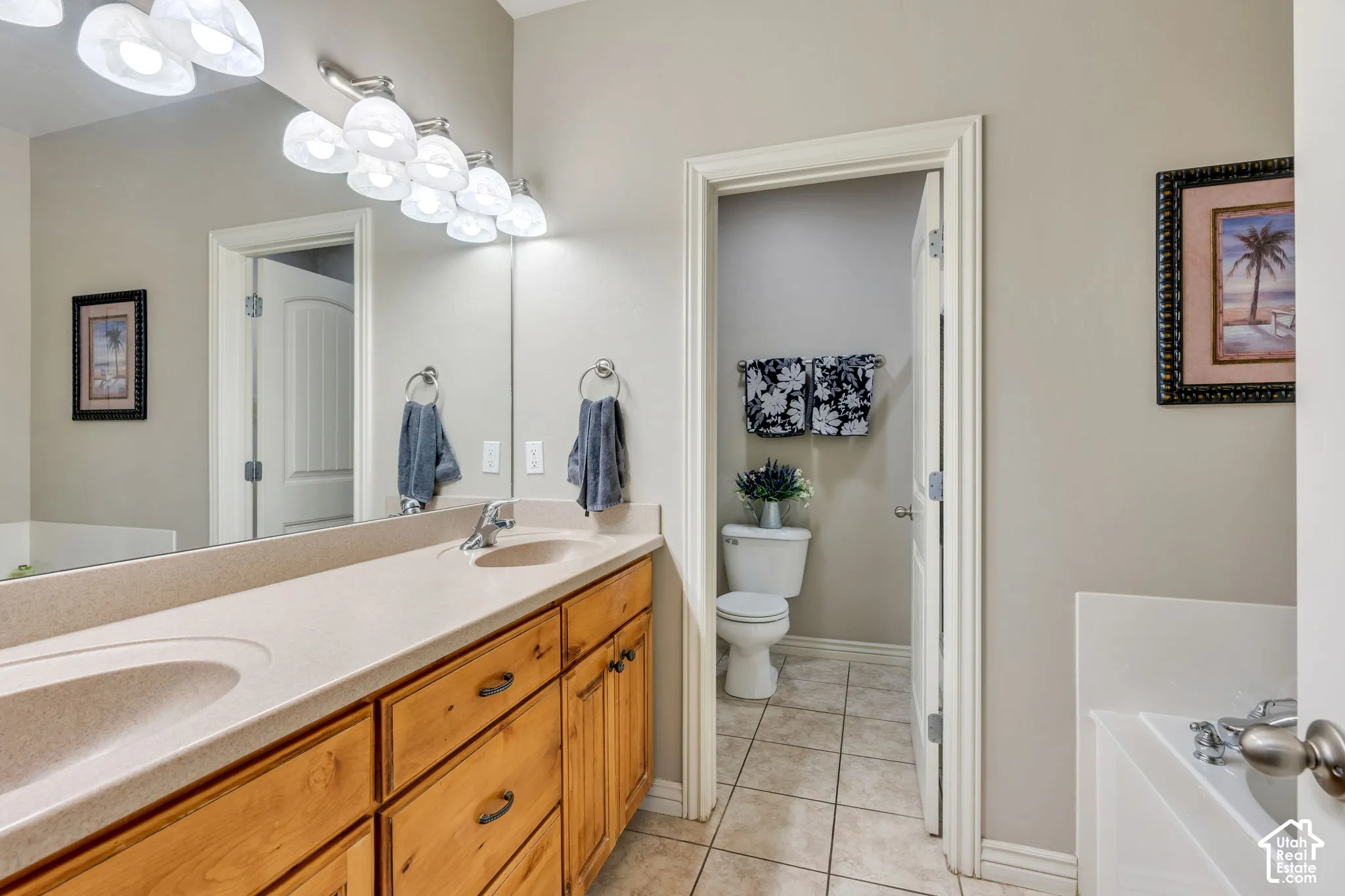 Bathroom featuring Dual sinks, soaker tub with jets, and separate shower