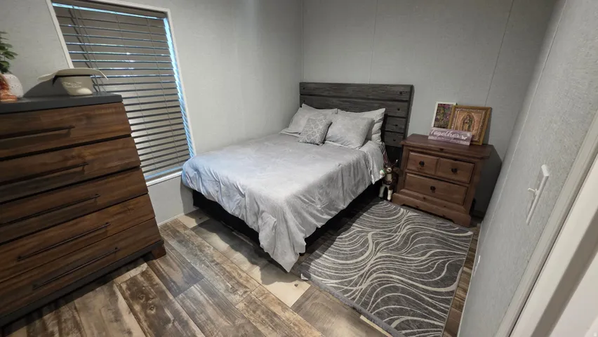 Wood-finish flooring with a horizontal slat wall paneling