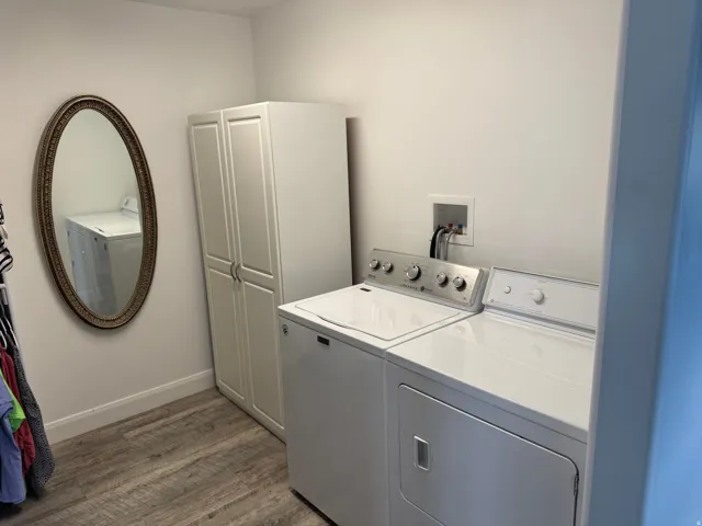 Laundry is in the master closet.