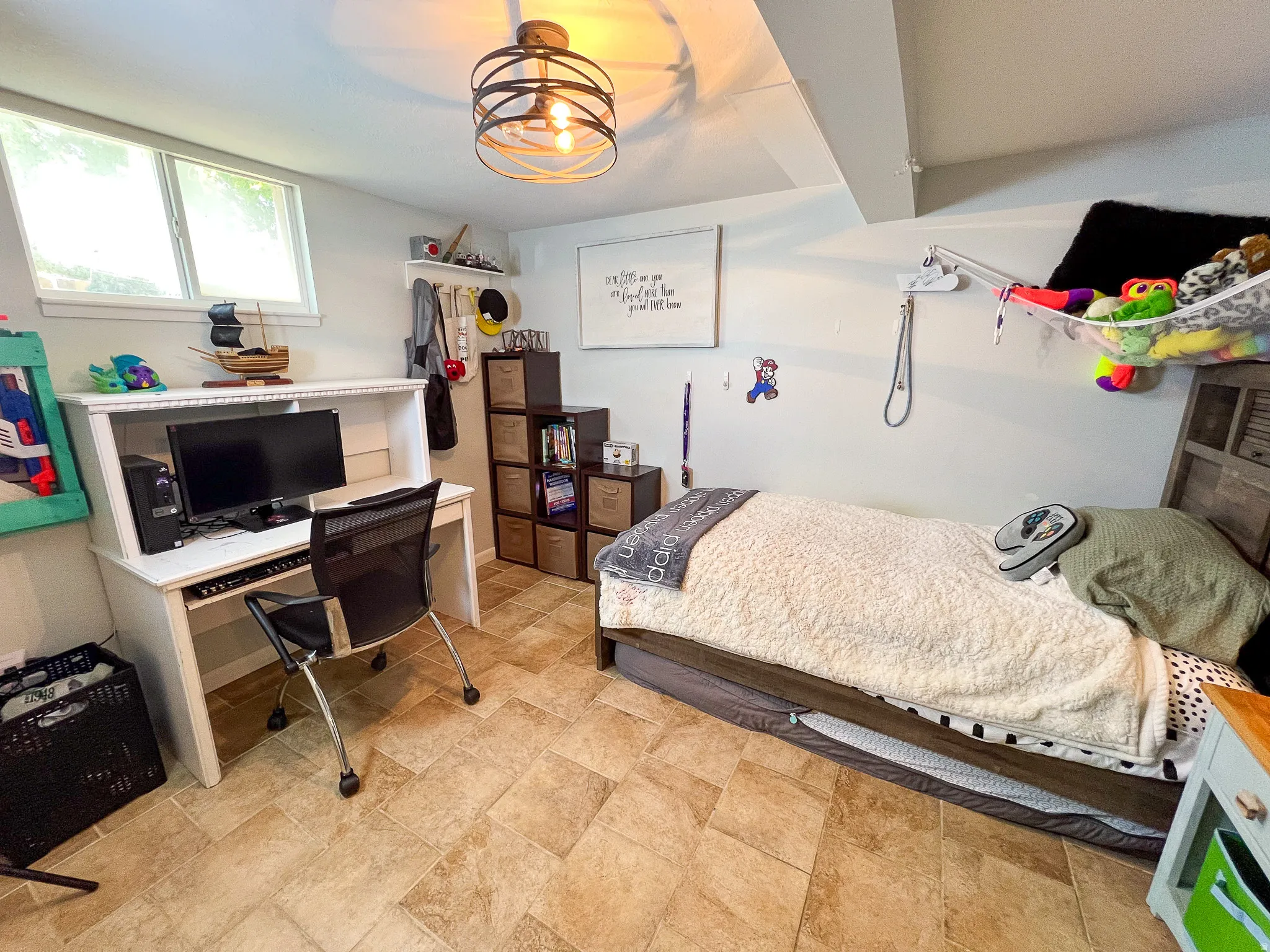 Recessed window with natural light, tile flooring, and a contemporary ceiling light fixture