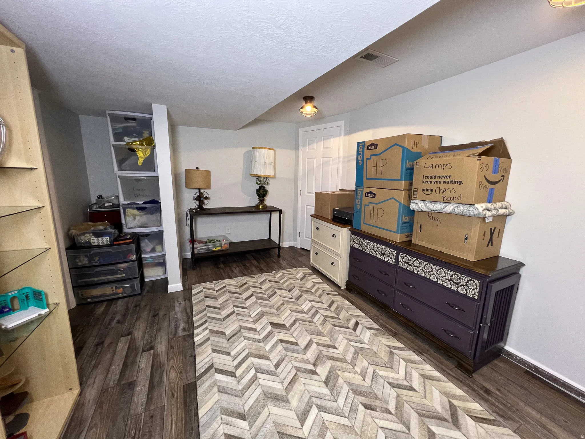 Basement Den/ Office, wood-finish flooring throughout