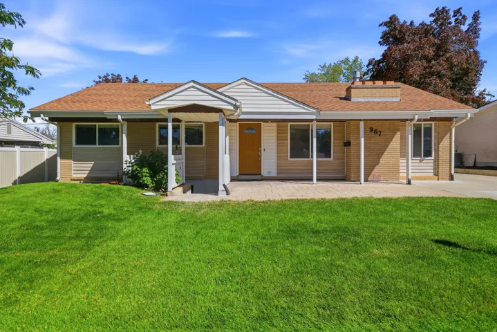 Brick and siding exterior with a shingled roof