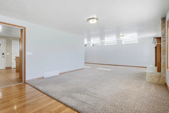 Open living area with light-colored walls