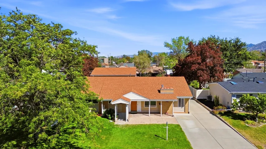 Paved driveway and a covered entryway