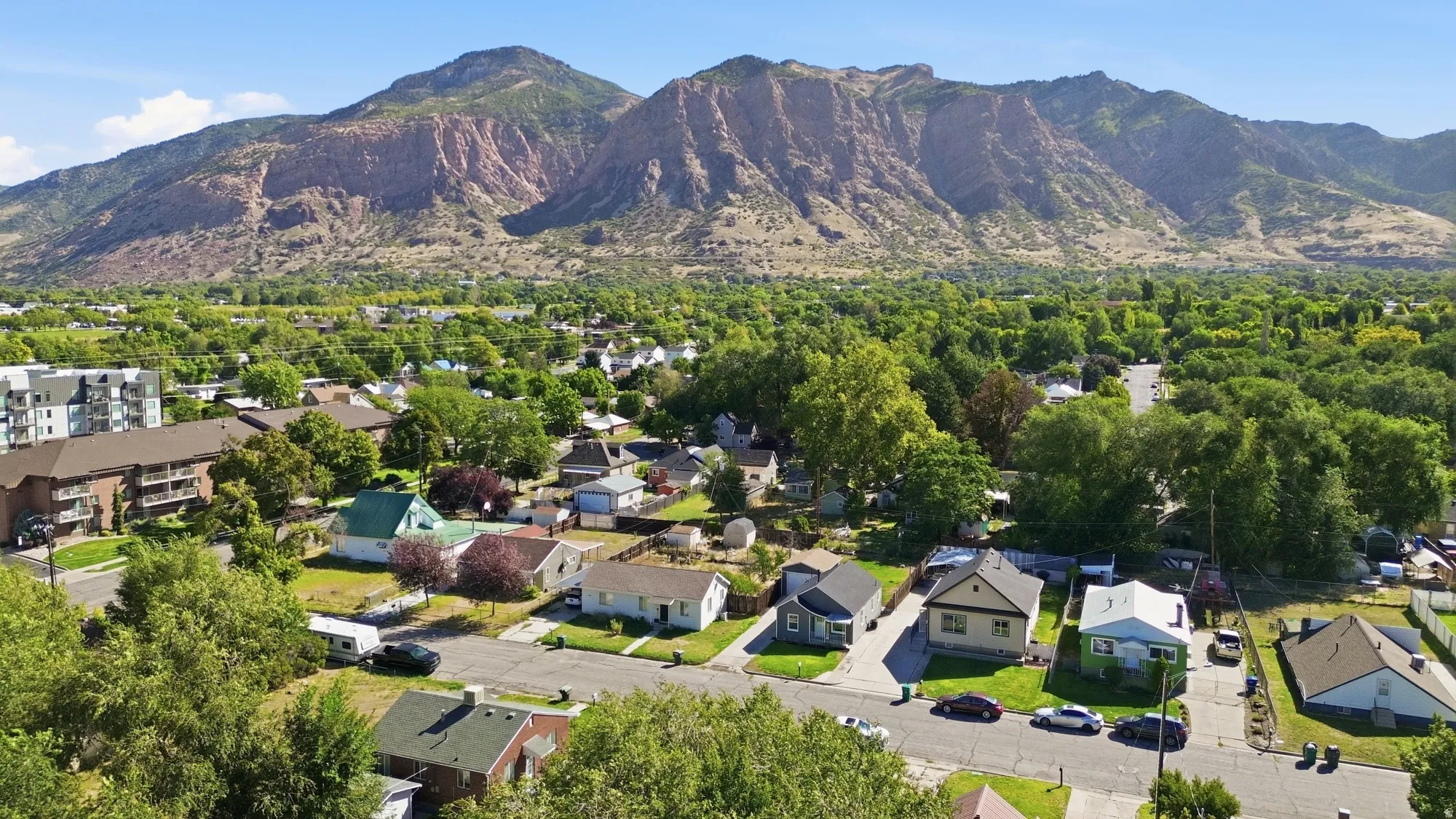 Neighborhood setting with established residential properties and expansive mountain scenery