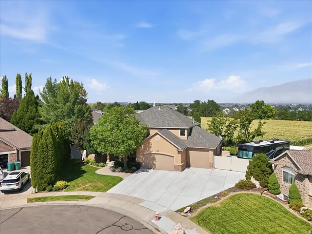 Expansive driveway with a double-car garage