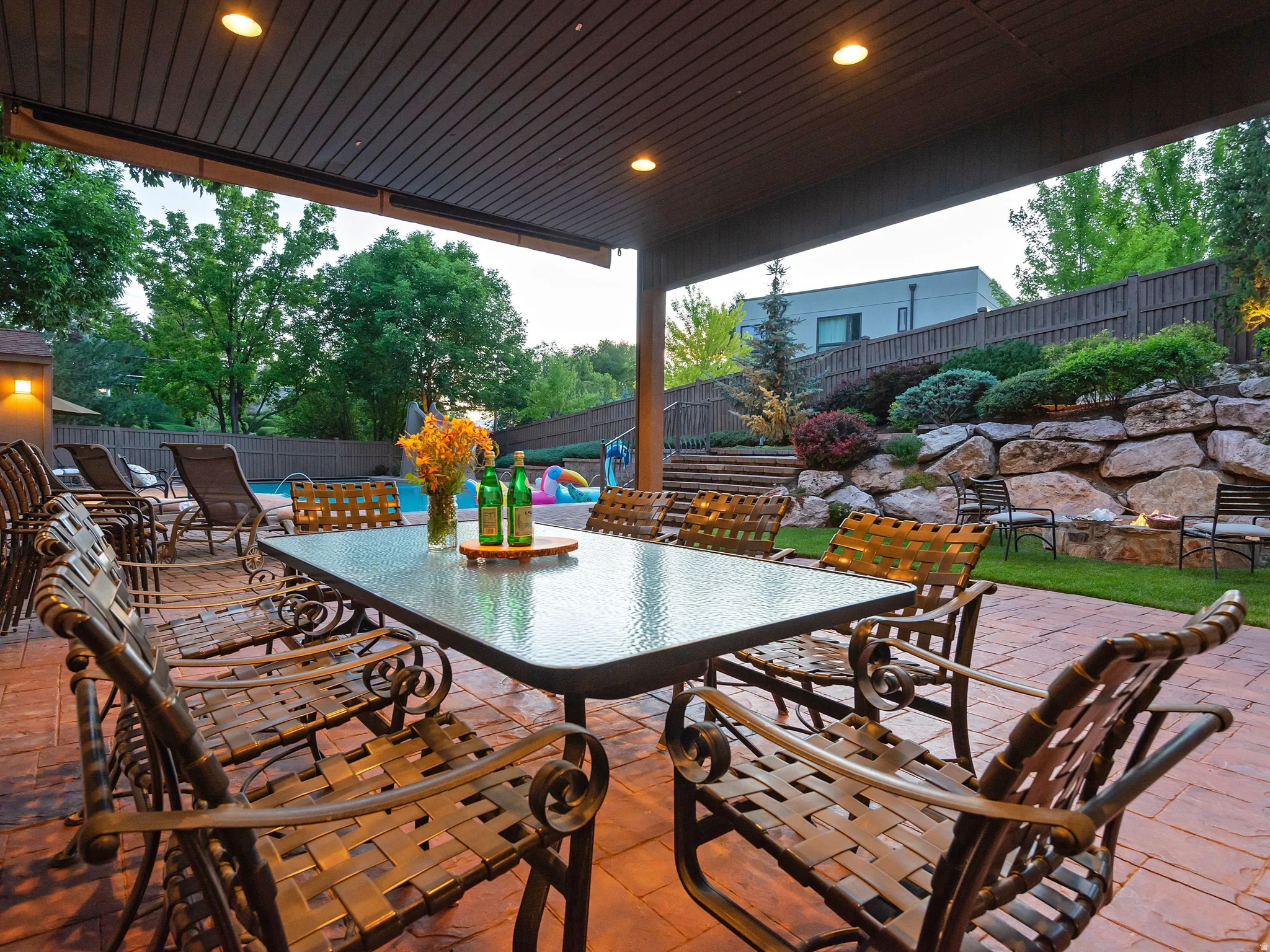 Covered patio with recessed lighting, stamped concrete flooring, and an in-ground swimming pool