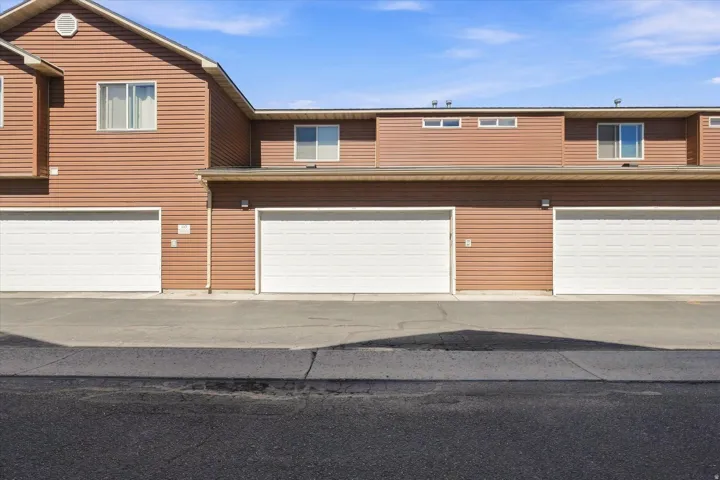 Siding exterior with multiple garage doors