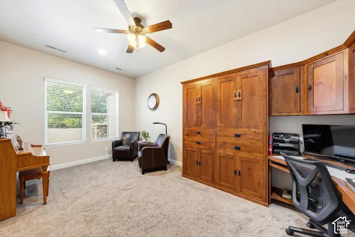 Built-in wood cabinetry with integrated desk