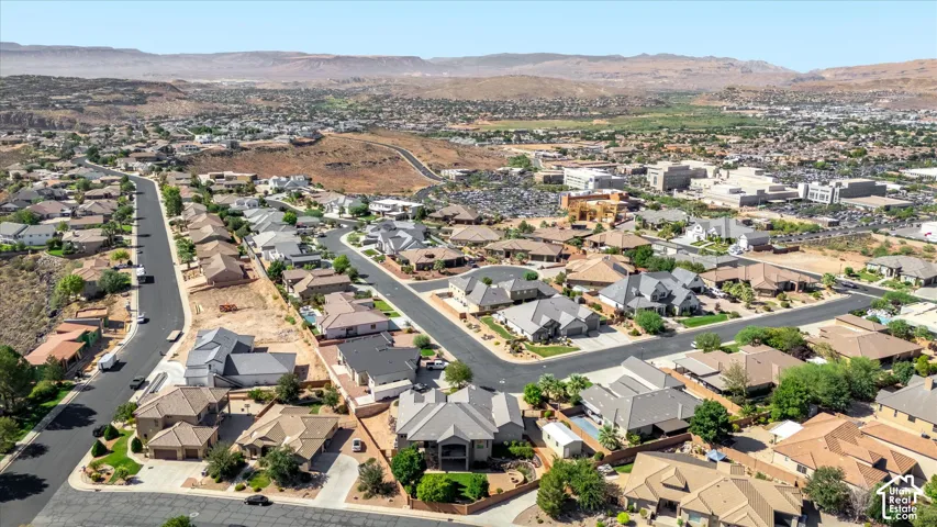 Residential development featuring varied architectural styles and paved roadways