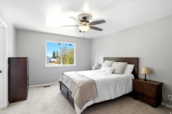 Neutral wall finishes and carpeted flooring
