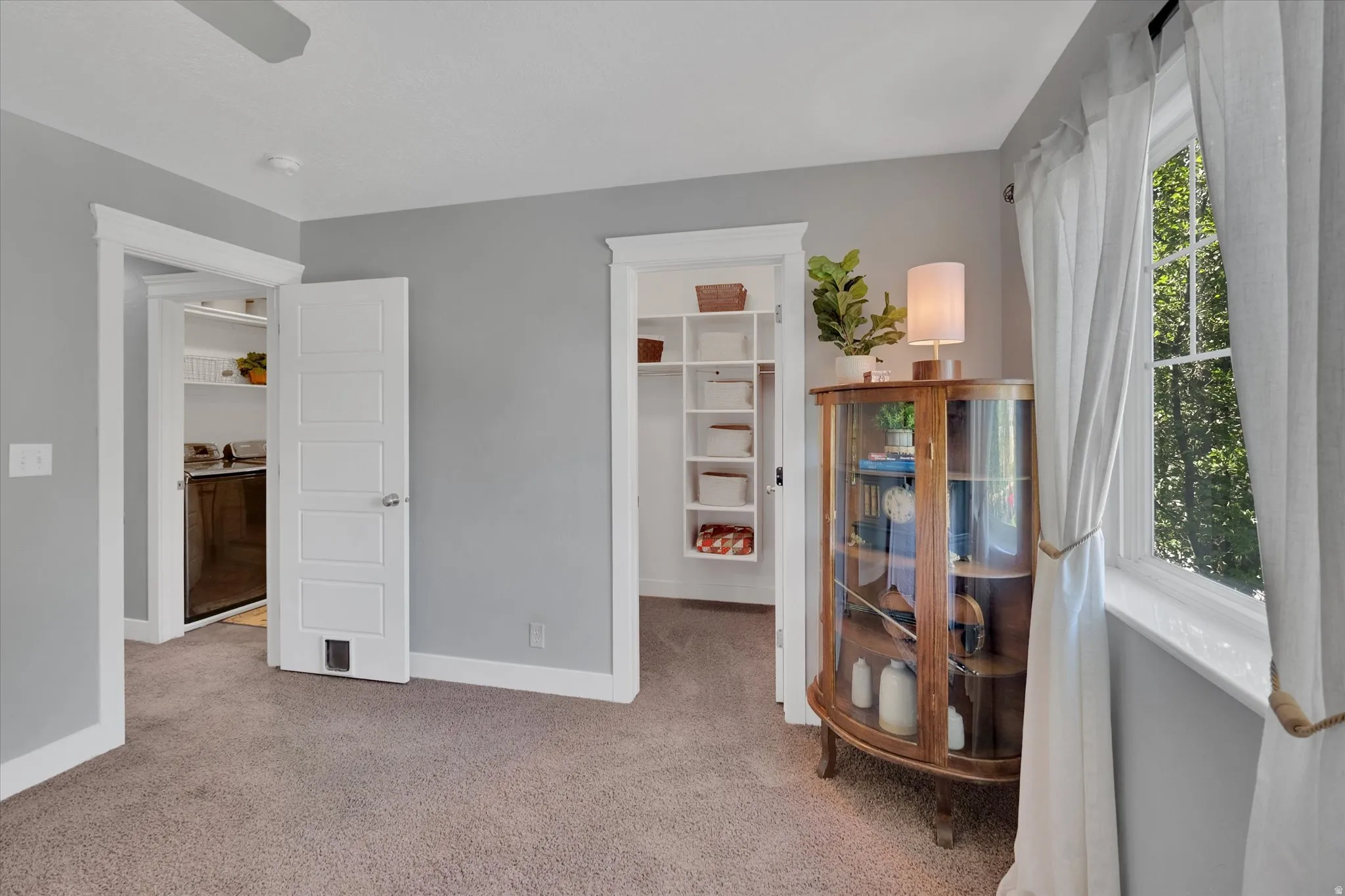 Wall-to-wall carpeting and neutral wall tones