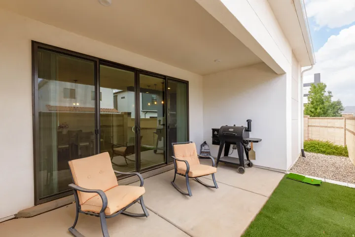 Covered patio with concrete flooring, recessed lighting, and sliding glass doors