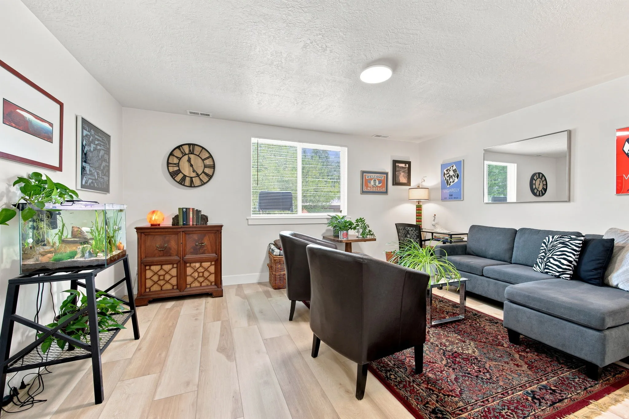 Recessed lighting, wood-finish flooring, and multiple windows