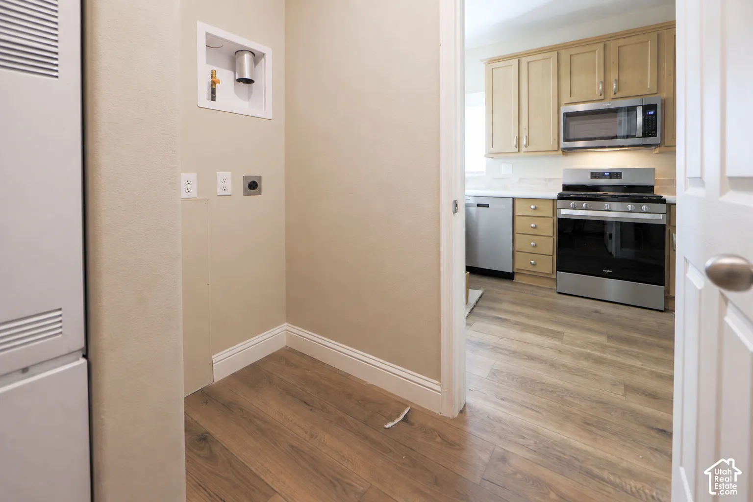 Dedicated laundry area with hookups