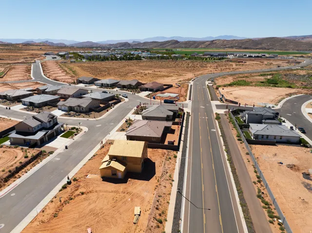 New residential development featuring paved streets and established homes