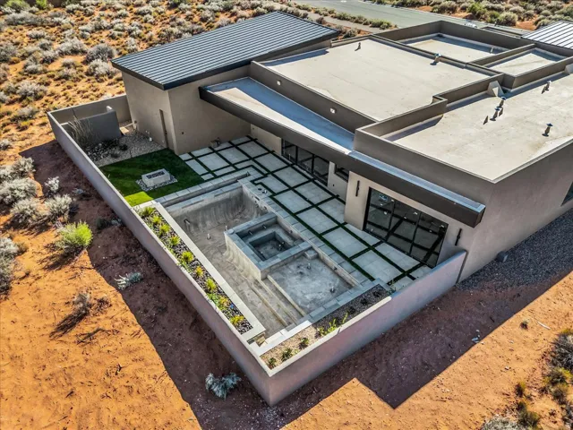 Modern exterior with a flat roofline and integrated covered patio