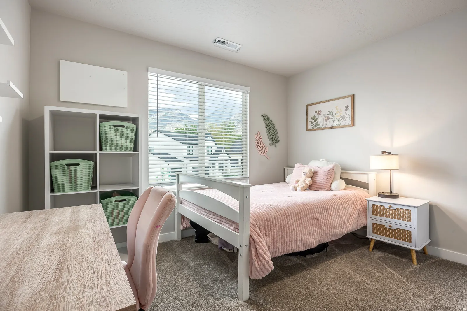 Window featuring horizontal blinds, neutral wall paint, and gray carpet flooring