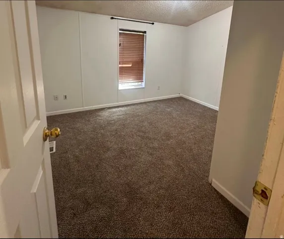 Wall-to-wall carpeting and neutral wall tones