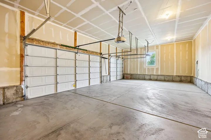 Oversized 3 car garage. Plenty deep for most trucks (measure to make sure it fits your truck).
