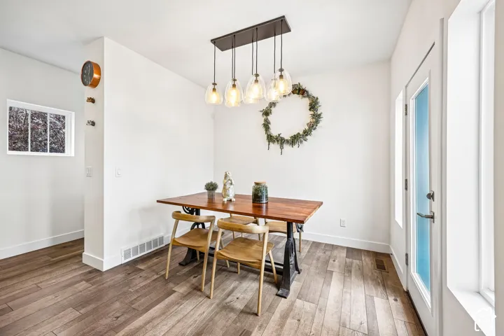 Laminate flooring and a custom multi-light pendant fixture