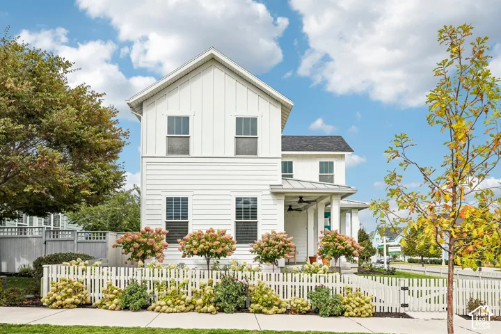 White board and batten exterior with horizontal siding accents