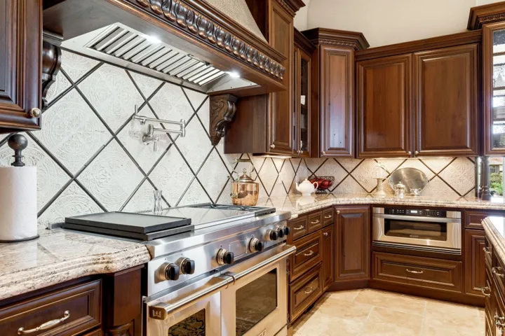 Rich wood cabinetry with decorative molding