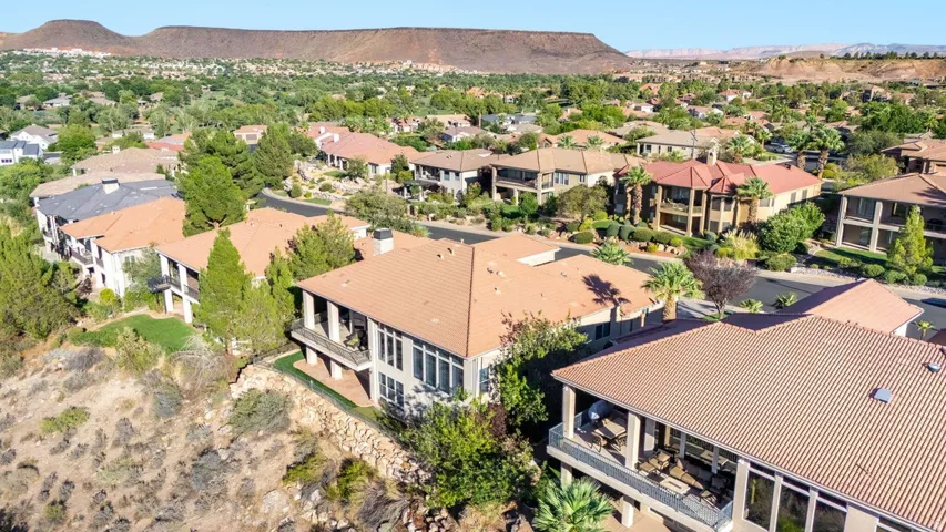 Multiple residences with terracotta-style roof tiles and stucco exteriors