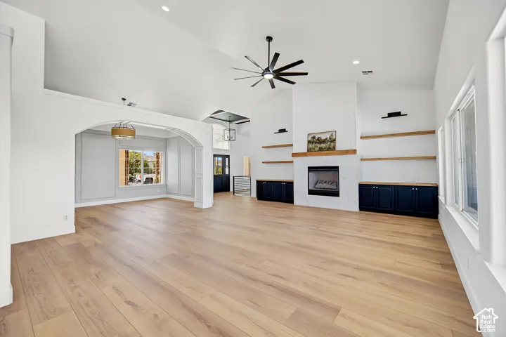 Vaulted ceilings and light wood-finish flooring