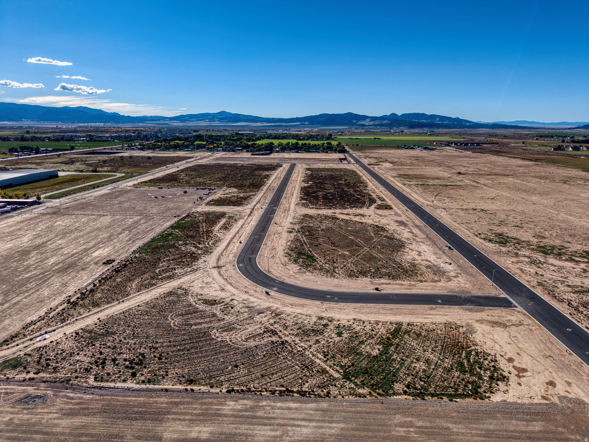 Developed land featuring paved roads and visible lot divisions
