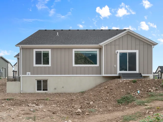 Board and batten siding with white trim