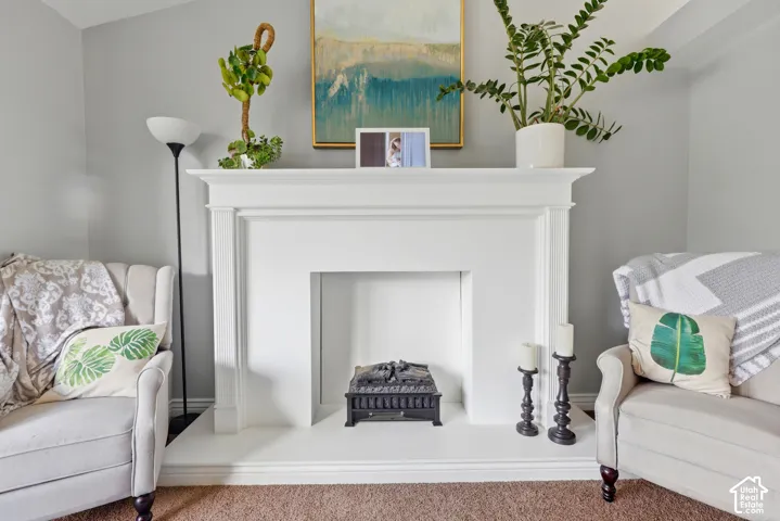 White fireplace surround with mantel