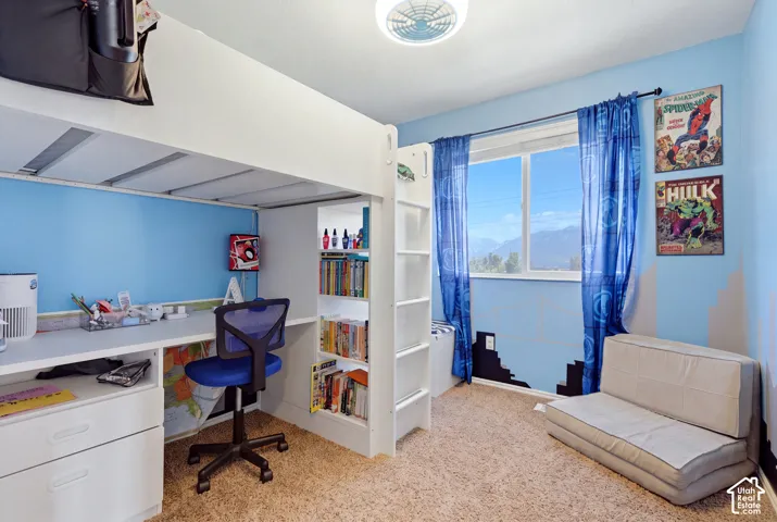 Built-in loft bed with integrated desk and shelving