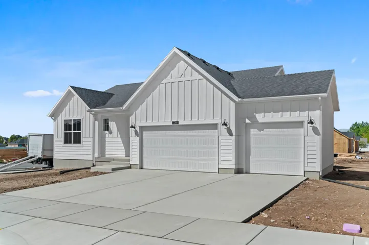 White board and batten exterior with horizontal siding accents