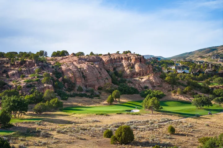 Expansive green landscaping with a manicured golf course