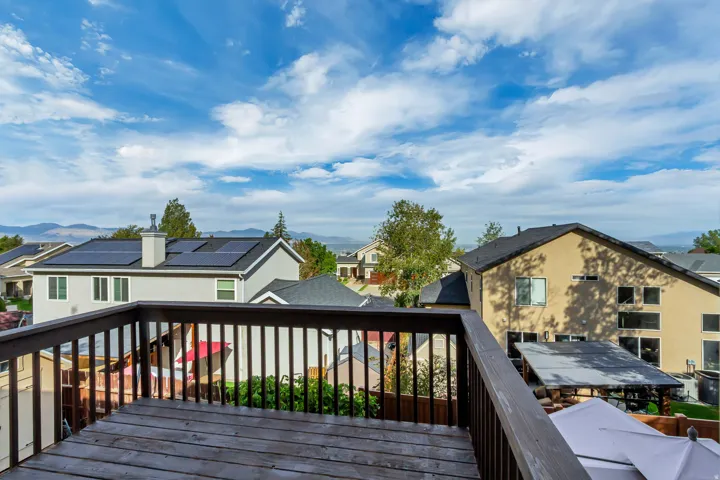 Wood-finish deck with dark railings