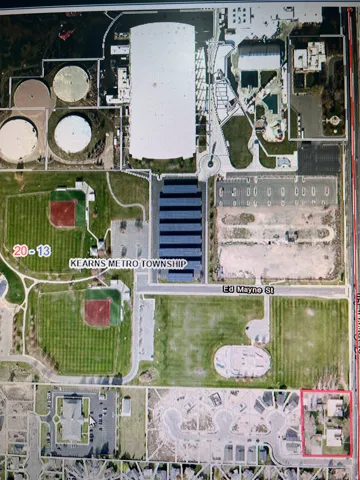 Aerial Map. Displaying the property and surrounding structures with an outlined parcel