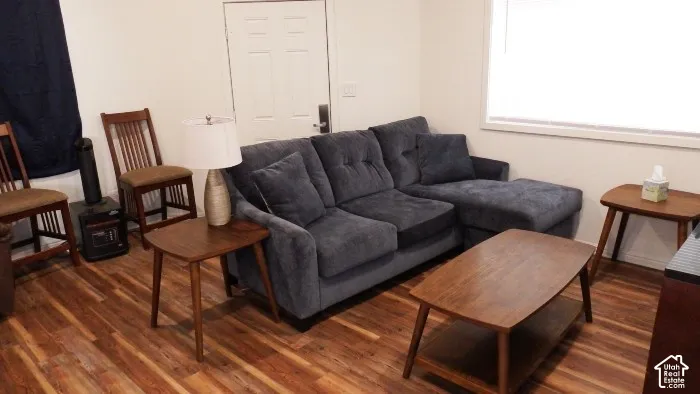 Wood-finish flooring throughout the space