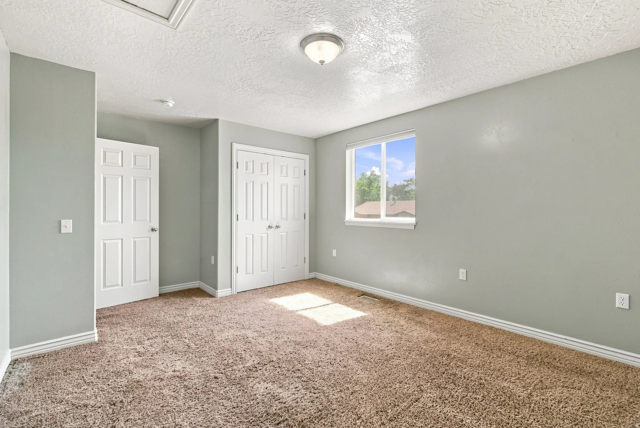Additional Guest Bedroom with mountain window views.