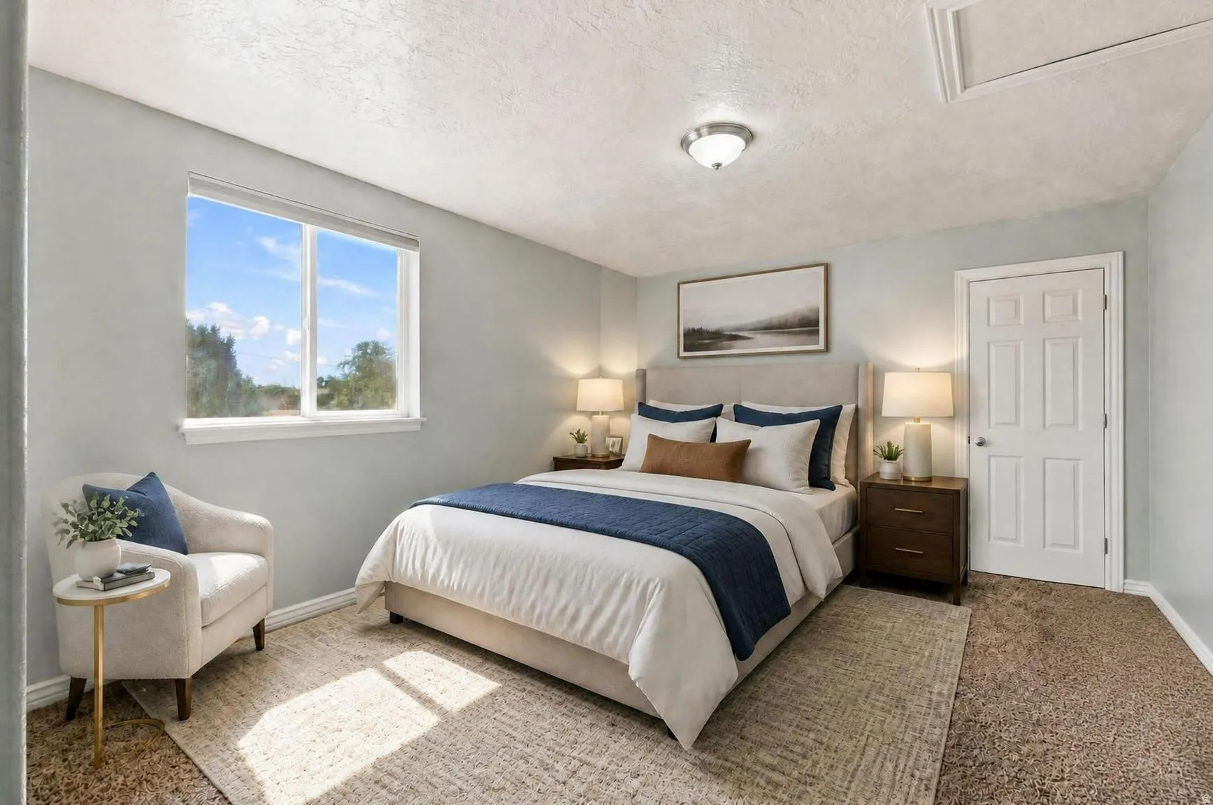 Upstairs guest bedroom with mountain views. This picture has been virtually staged.