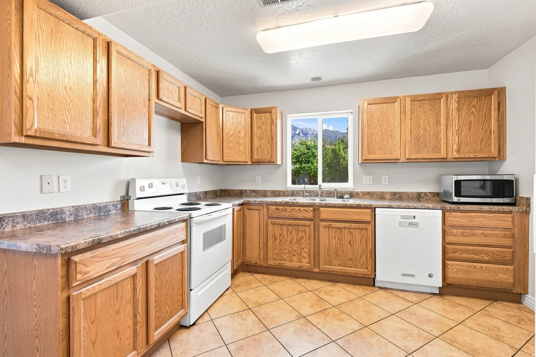 Main level kitchen with mountain views from the kitchen window.