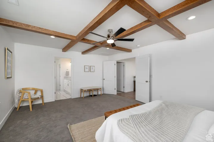 Coffered ceiling with wood beams and recessed lighting
