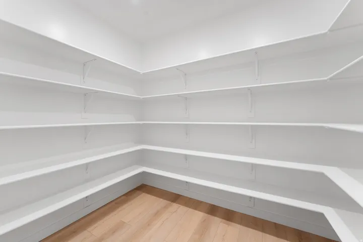 Wraparound shelving system with a wood-finish floor