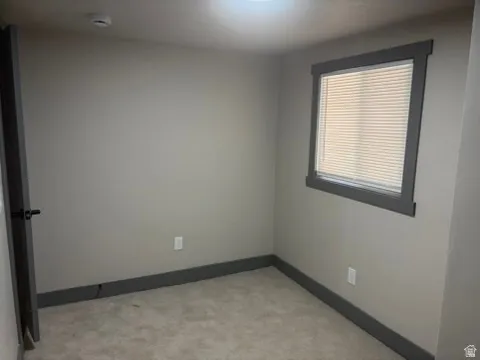 Neutral tone wall paint with contrasting trim