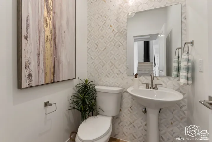 PHOTOS ARE OF A PREVIOUS MODEL HOME featuring the same floor plan and are provided for illustrative purposes only. Colors, finishes, fixtures, and selections may vary. Home will be delivered unfurnished
