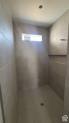 Primary shower tile is in!