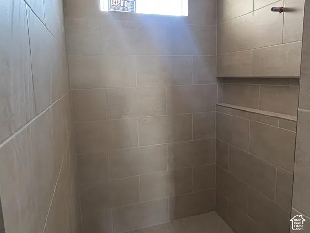 Primary shower tile is in!