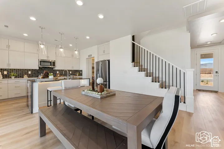 PHOTOS ARE OF A PREVIOUS MODEL HOME featuring the same floor plan and are provided for illustrative purposes only. Colors, finishes, fixtures, and selections may vary. Home will be delivered unfurnished
